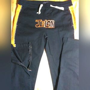 JELON MENS PANTS SZ. LG POCKETS FRONT/ BACK BLACK/ ORANGE DETAILS